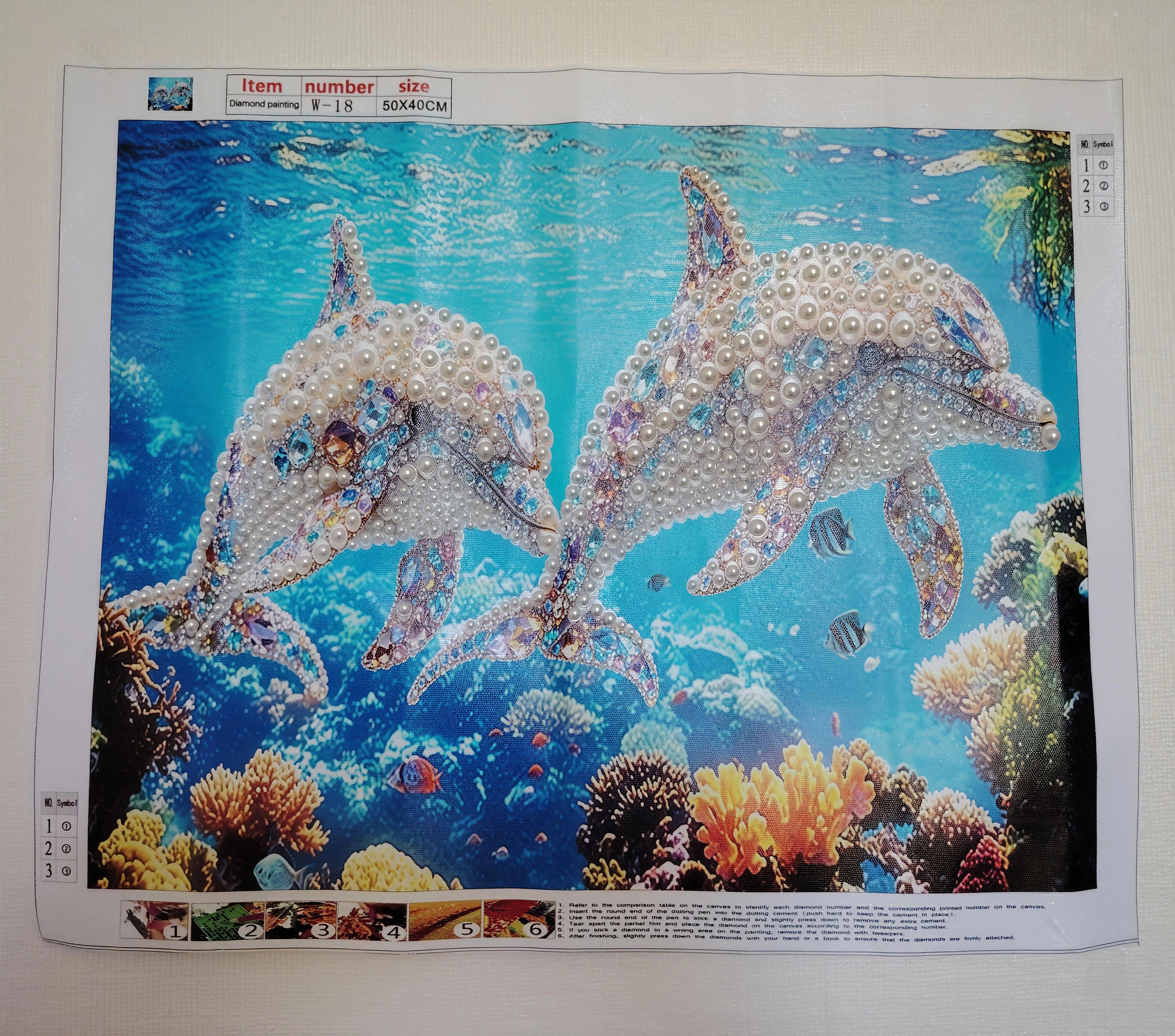 DAUPHINS EN PERLES
